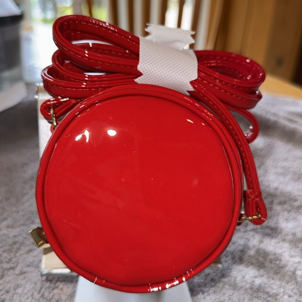 Marc Jacobs Deep Red Crossbody Bag with Glossy Finish. Canteen Shape - Picture 2 of 2